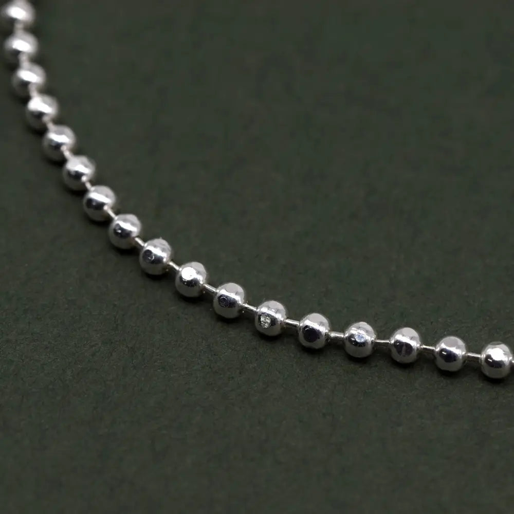 Elegant Sterling Silver Adjustable Minimalist Slider Bracelet with 2mm Beads for Women.
