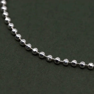 Elegant Sterling Silver Adjustable Minimalist Slider Bracelet with 2mm Beads for Women.