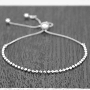 Elegant Sterling Silver Adjustable Minimalist Slider Bracelet with 2mm Beads for Women.
