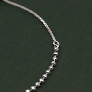 Elegant Sterling Silver Adjustable Minimalist Slider Bracelet with 2mm Beads for Women.