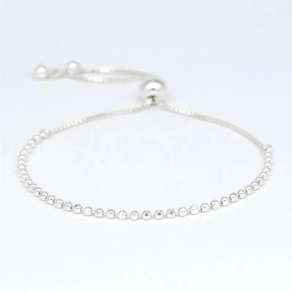 Elegant Sterling Silver Adjustable Minimalist Slider Bracelet with 2mm Beads for Women.
