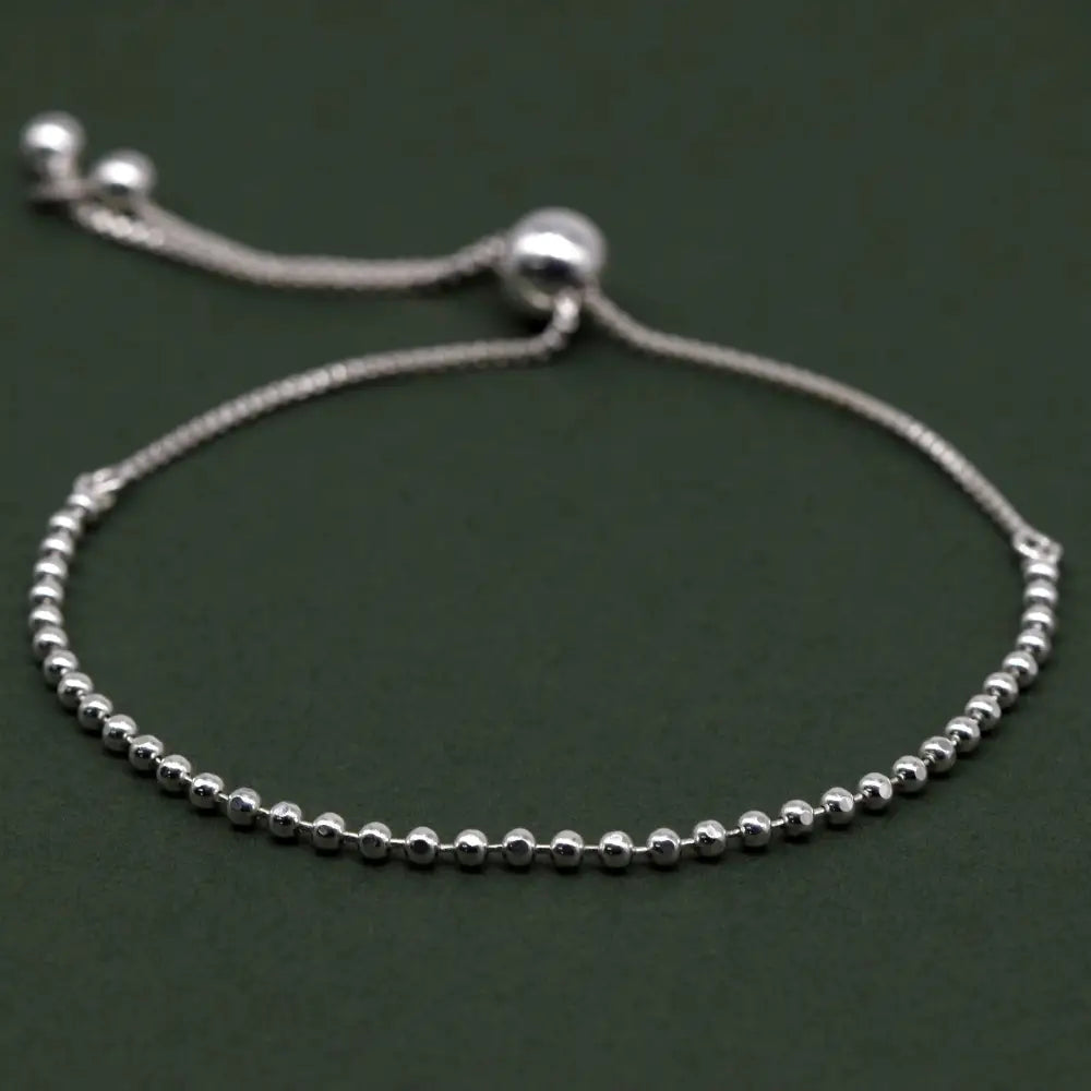 Elegant Sterling Silver Adjustable Minimalist Slider Bracelet with 2mm Beads for Women.