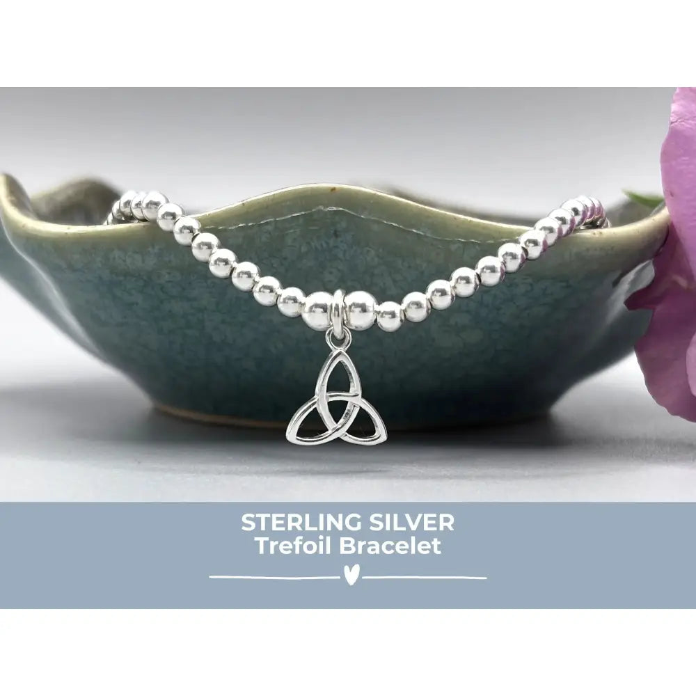 Elegant Sterling Silver Celtic Trinity Knot Bracelet with Trefoil Charm - Perfect Stacking Jewelry Gift.