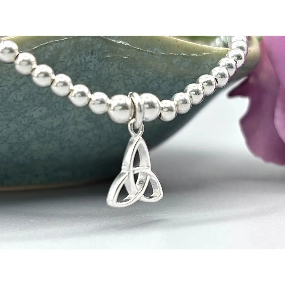 Elegant Sterling Silver Celtic Trinity Knot Bracelet with Trefoil Charm - Perfect Stacking Jewelry Gift.