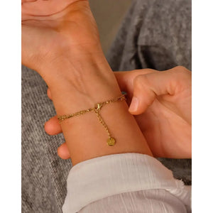 Elegant Waterproof Gold Stainless Steel Layered Bracelet - Dainty Stackable Design for Women.