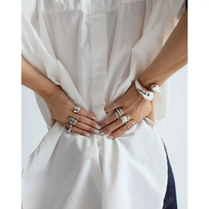 Elegantly Curved Coco Bangle.
