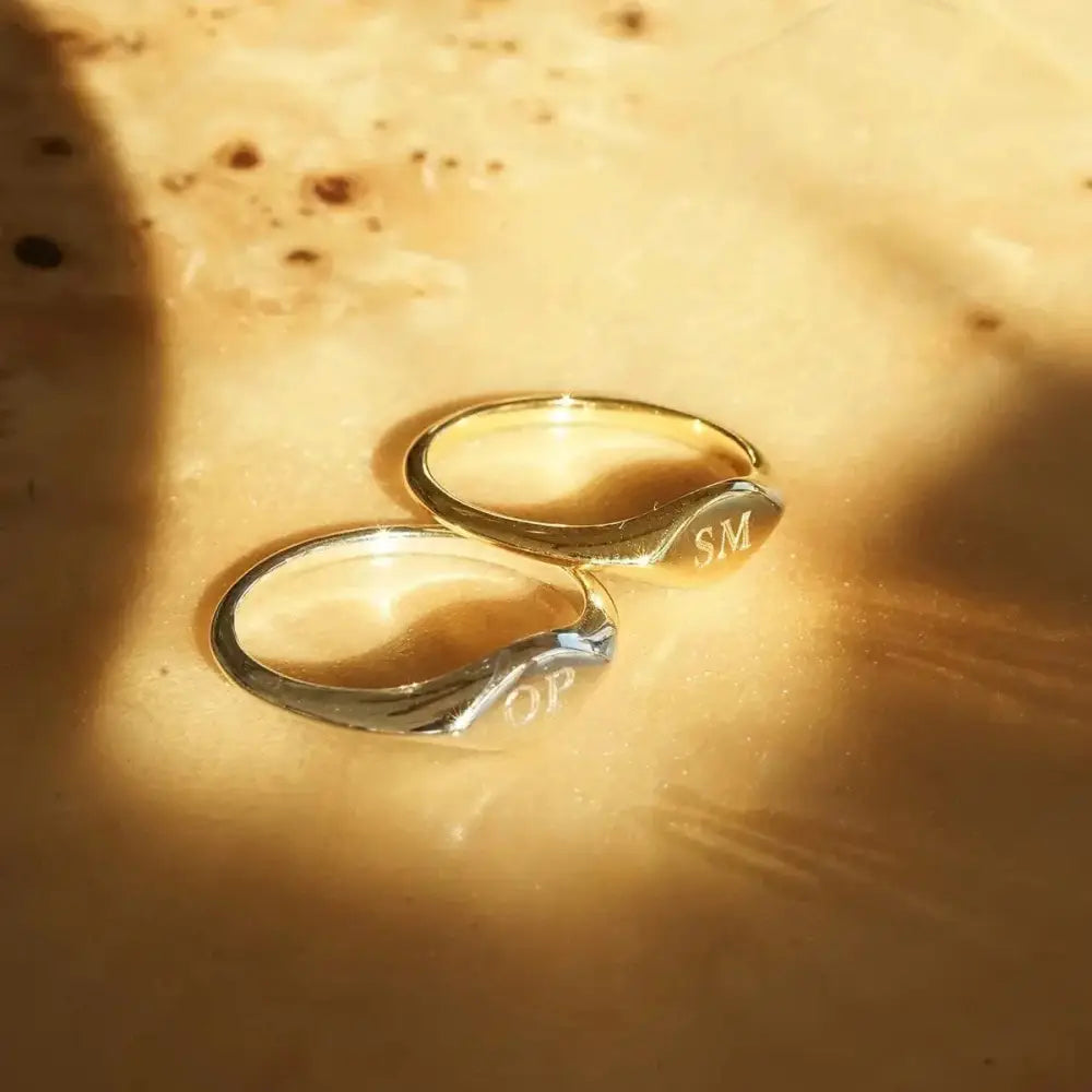 Elevate Your Style with the Estée Lalonde 18Ct Gold Plated Mini Signet Ring.