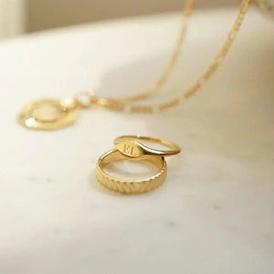 Elevate Your Style with the Estée Lalonde 18Ct Gold Plated Mini Signet Ring.