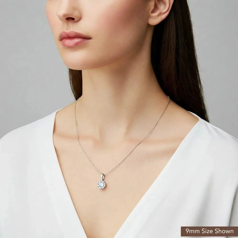 Exquisite 14K White Gold Classic Solitaire Pendant Necklace.