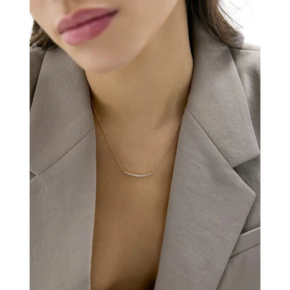 Exquisite Graduated Single Prong Diamond Necklace for Timeless Elegance.