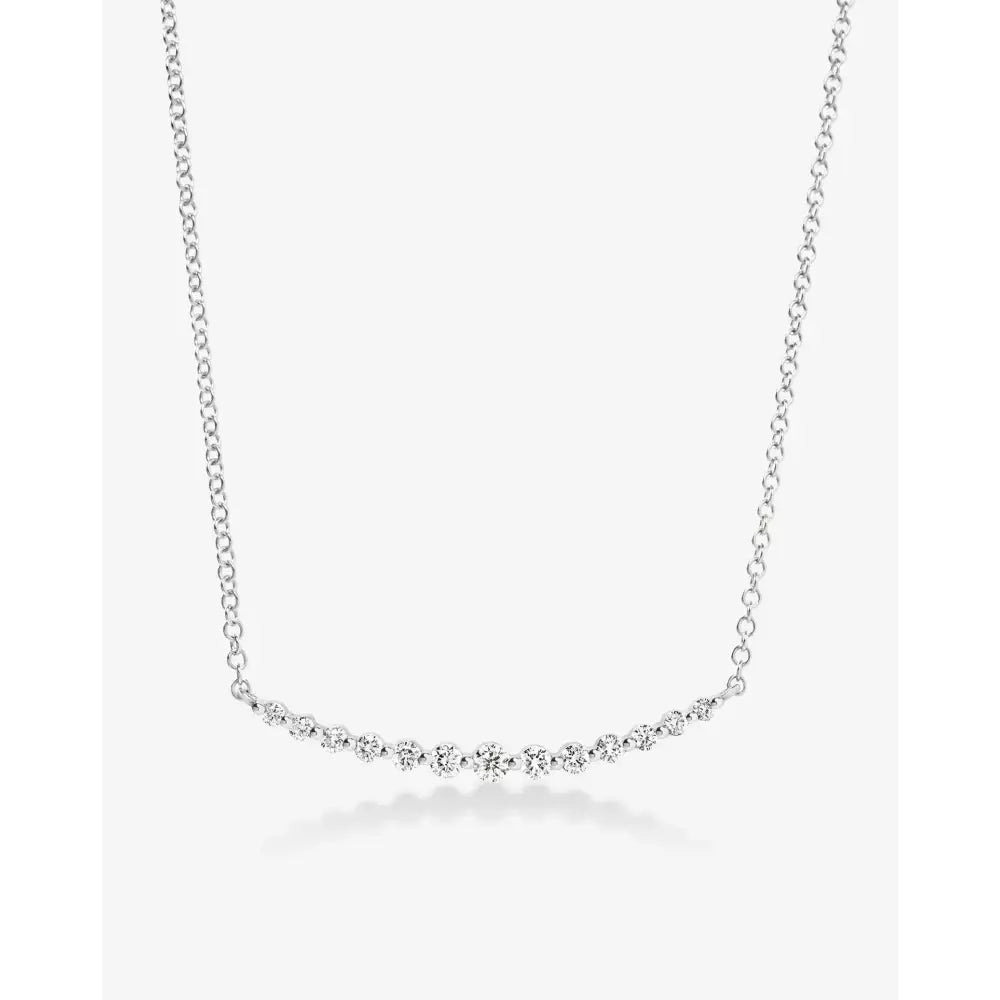 Exquisite Graduated Single Prong Diamond Necklace for Timeless Elegance.