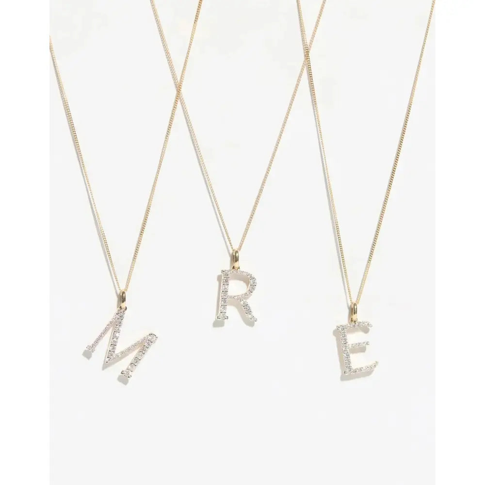 Exquisite Large Diamond Initial Pendant - Personalize Your Elegance.