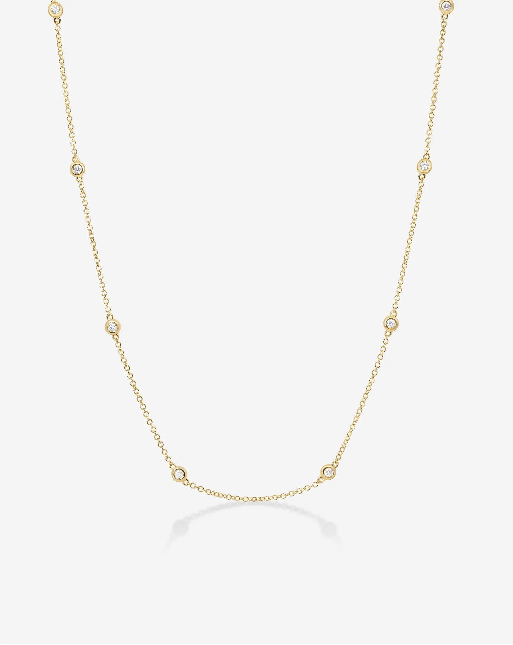 Stunning Diamond Bezel Station Necklace for Timeless Elegance.
