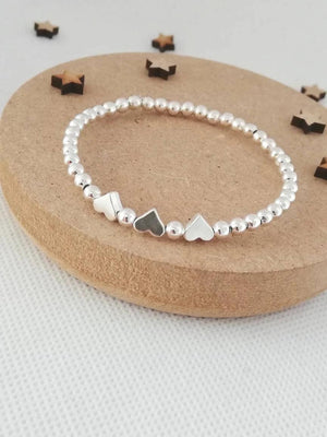 Charming Silver Heart Stretch Bracelet - Perfect Beaded Stacking Gift for Girlfriend or Teacher.