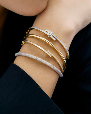 Elegant Baguette and Round Diamond Wrap Bangle.