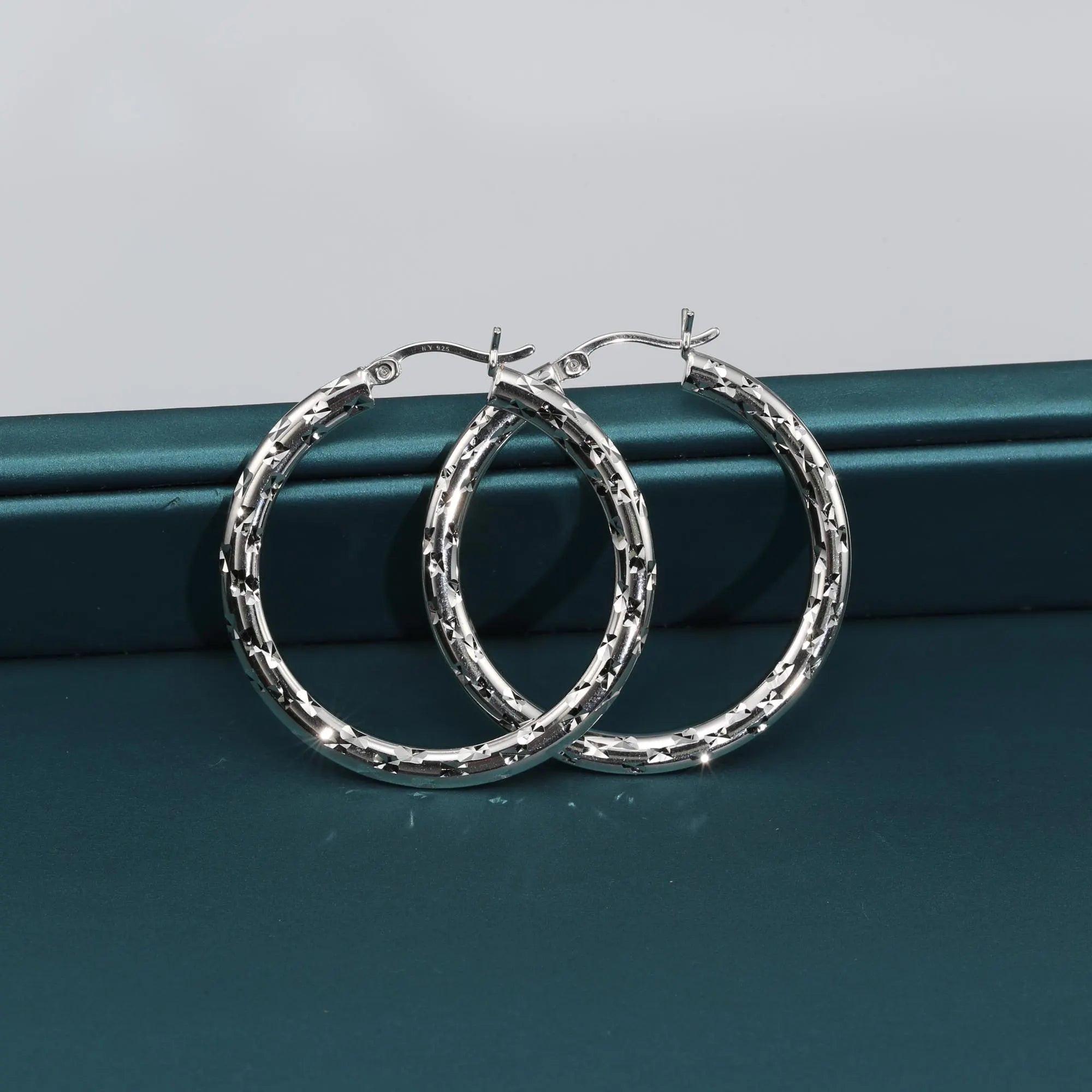 Elegant 35mm Sterling Silver Skinny Hoop Earrings.