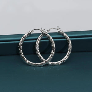 Elegant 35mm Sterling Silver Skinny Hoop Earrings.