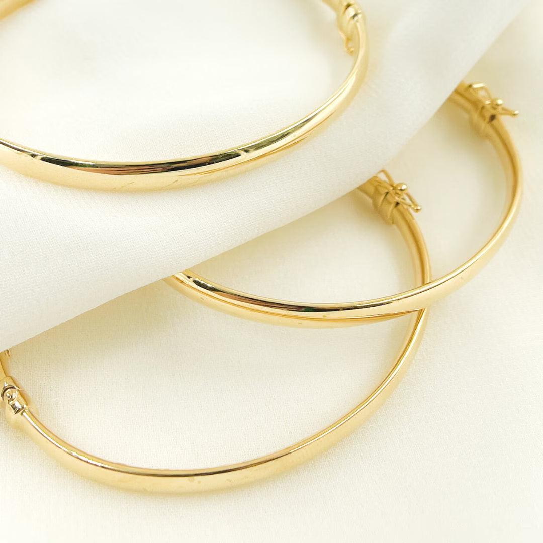 Elegant 14K Solid Gold Hinged Bangle Bracelet - 7 Inch Hollow Smooth Stackable Design.
