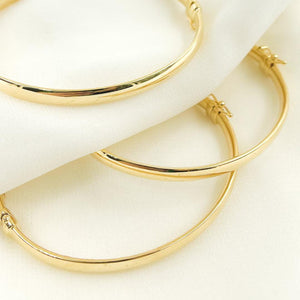 Elegant 14K Solid Gold Hinged Bangle Bracelet - 7 Inch Hollow Smooth Stackable Design.