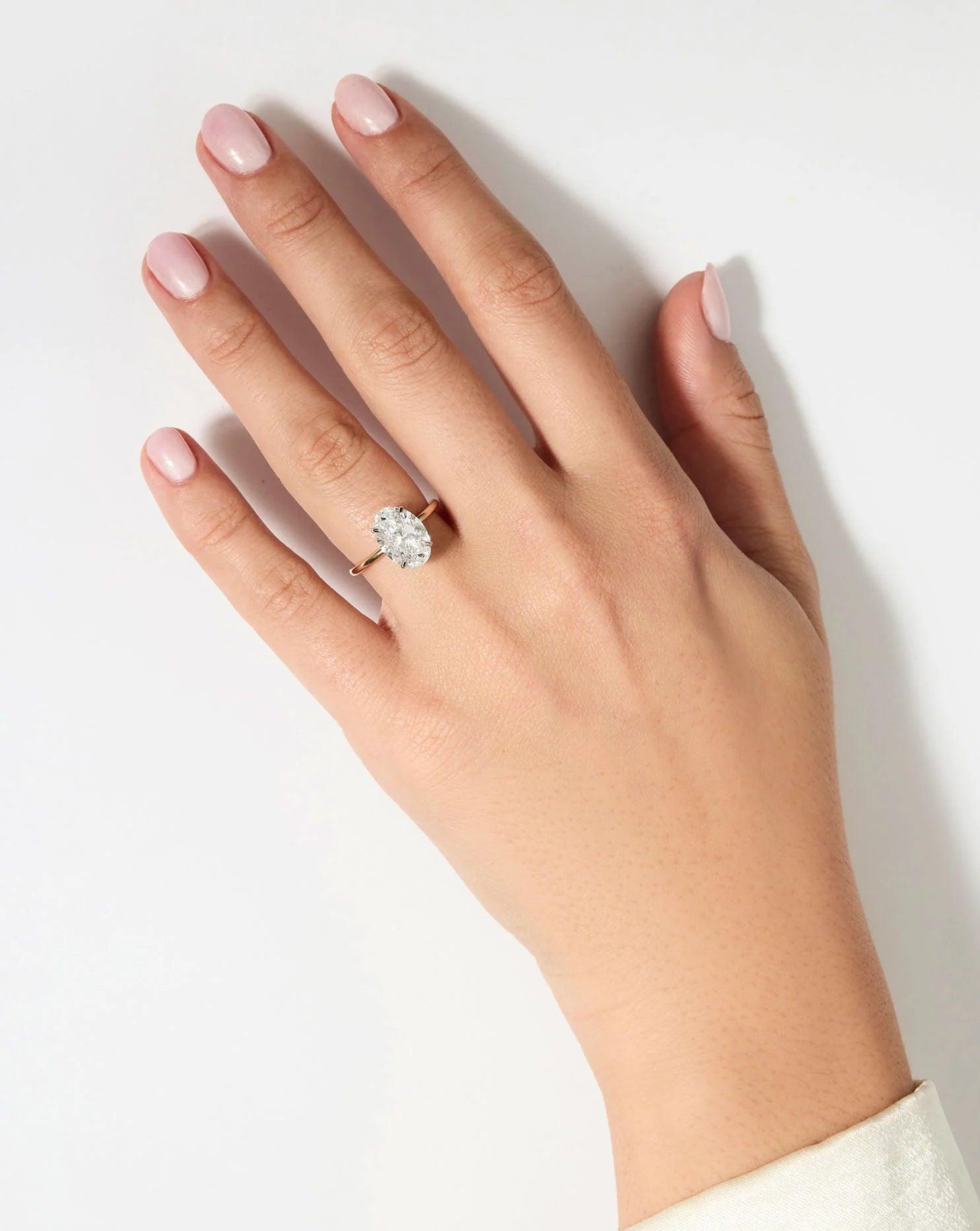 Stunning 3.28ct Oval Lab Diamond Engagement Ring in Ultra Thin 14K Gold Solitaire Setting.
