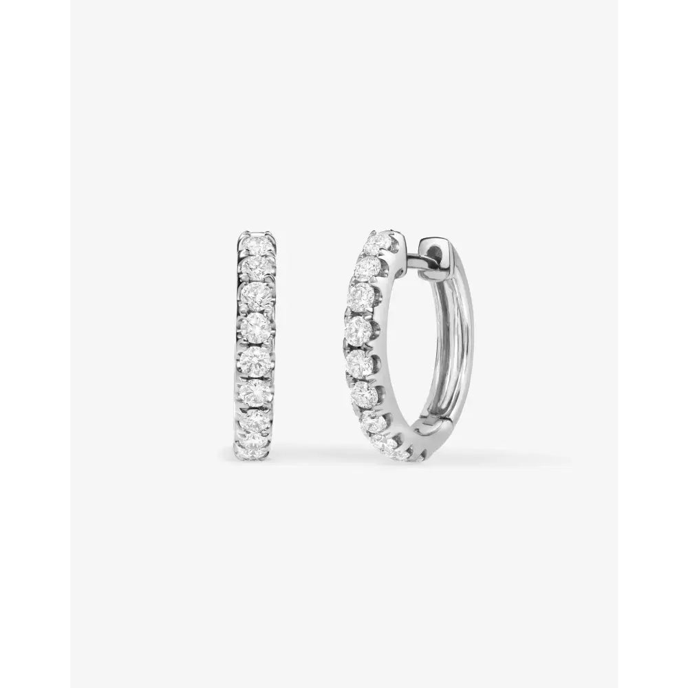 Glamorous Jumbo Diamond Huggie Earrings.