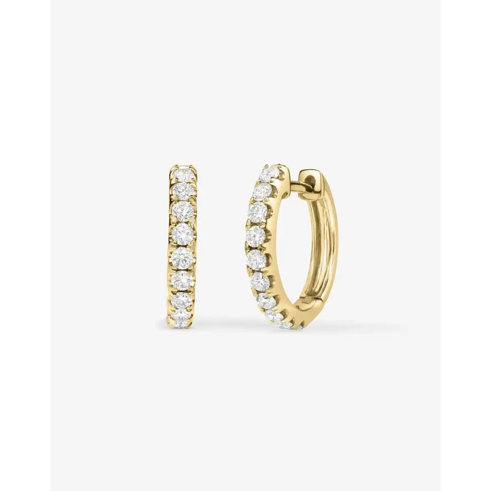 Glamorous Jumbo Diamond Huggie Earrings.