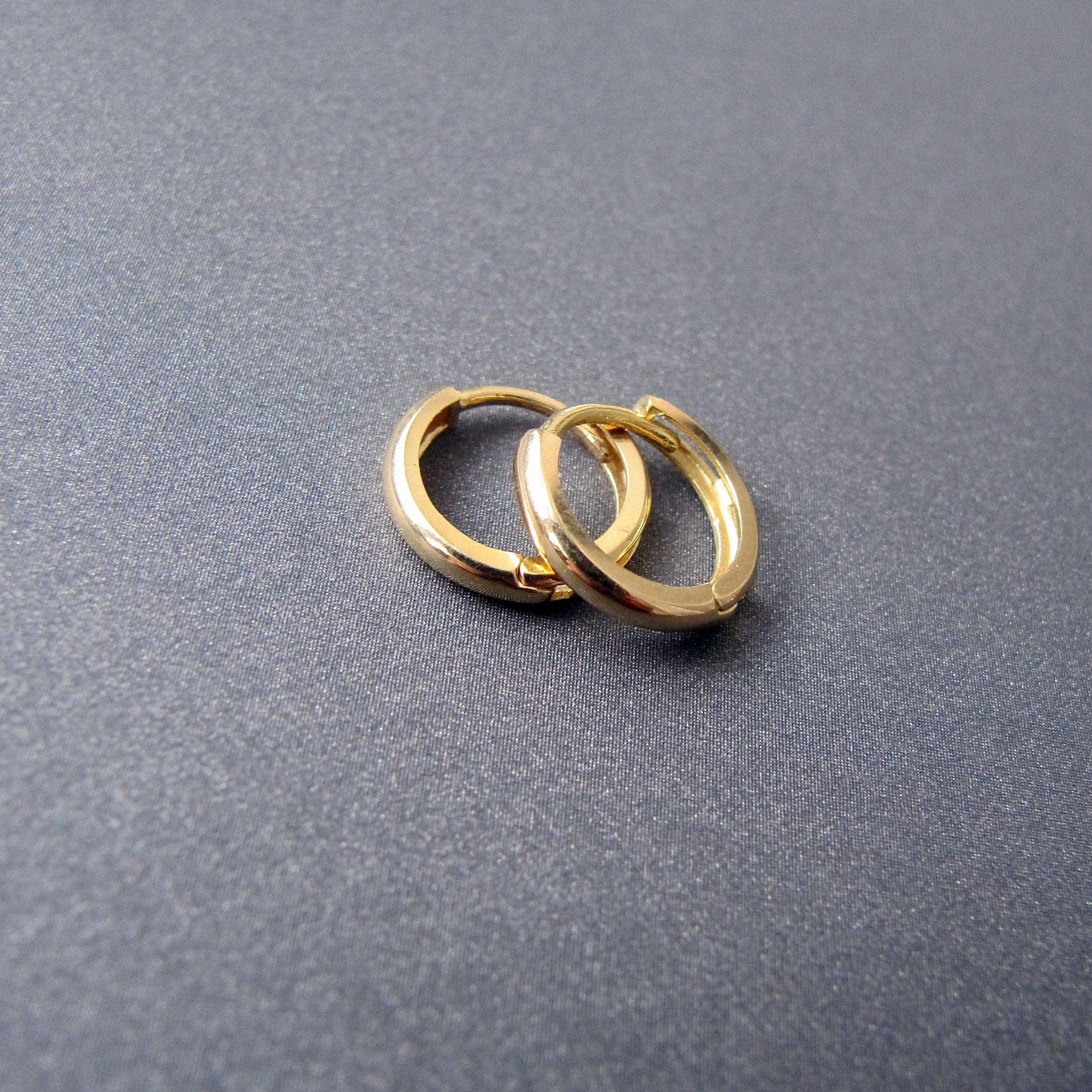 Stunning 14K Solid Gold Oval Hoop Earrings - Dainty Skinny Huggie Hoops for Elegant Women.
