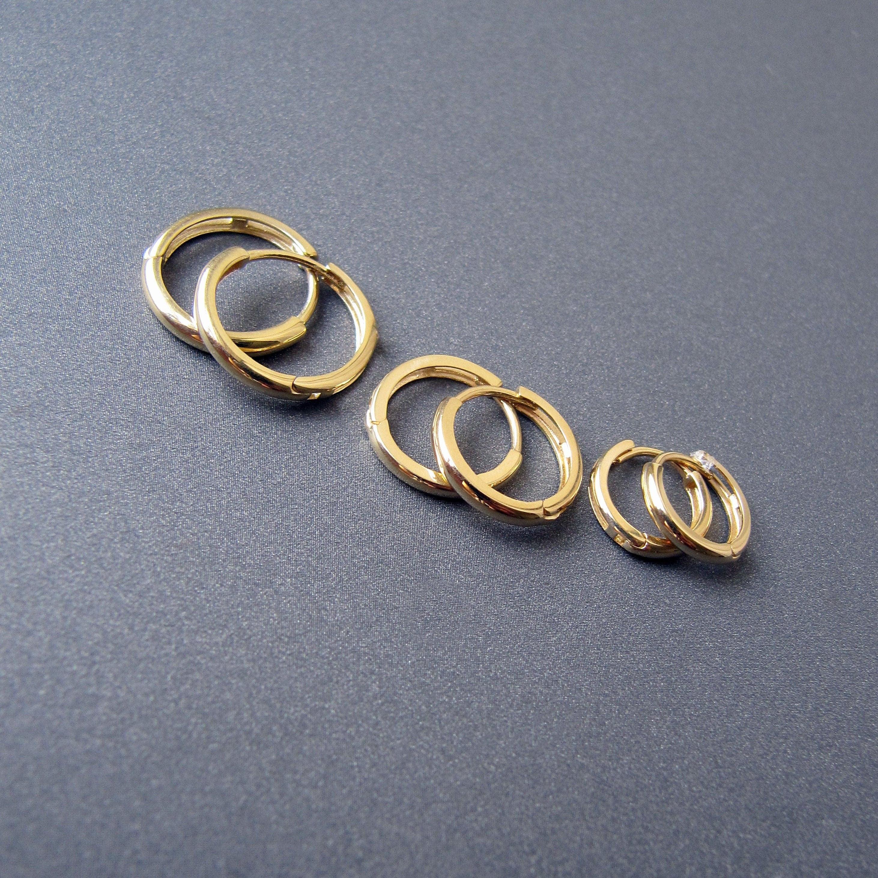Stunning 14K Solid Gold Oval Hoop Earrings - Dainty Skinny Huggie Hoops for Elegant Women.