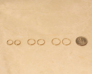 Chic 14K Solid Gold Endless Hoop Earrings - Elegant Tiny Huggie Hoops for Every Occasion.