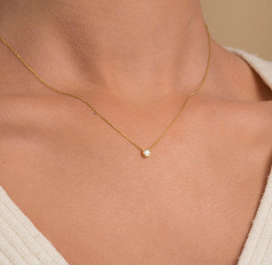 Elegant 14K Gold Diamond Solitaire Necklace - Minimalist Bezel Setting for Timeless Style.