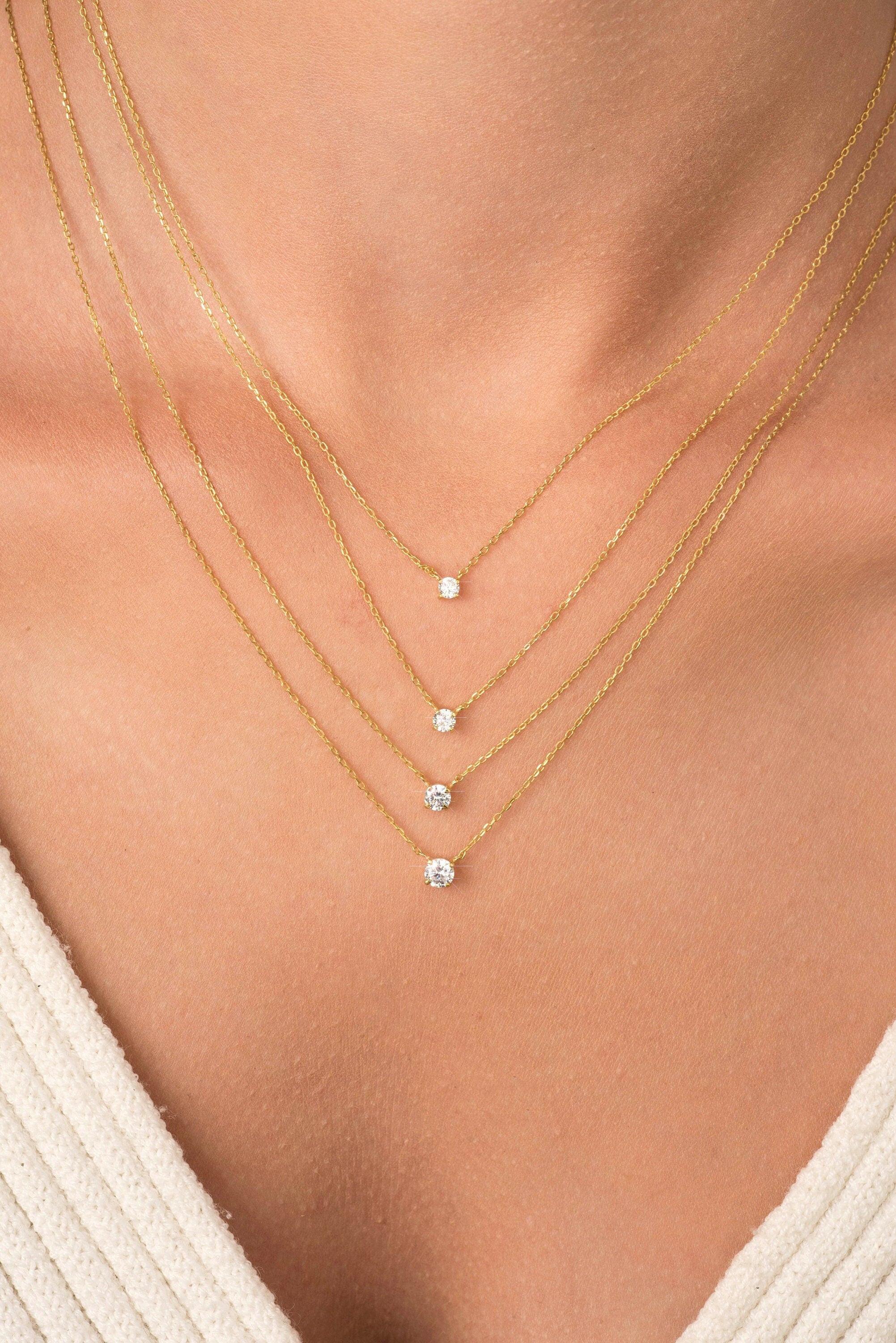 Stunning 14K Gold Diamond Solitaire Necklace – Elegant Dainty Floating Design for Effortless Minimalist Style.