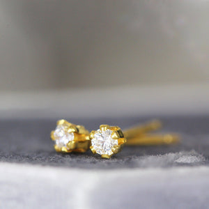 Stunning 2mm White Diamond Stud Earrings in Yellow Gold - Perfect Fine Jewelry Gift for Any Occasion.