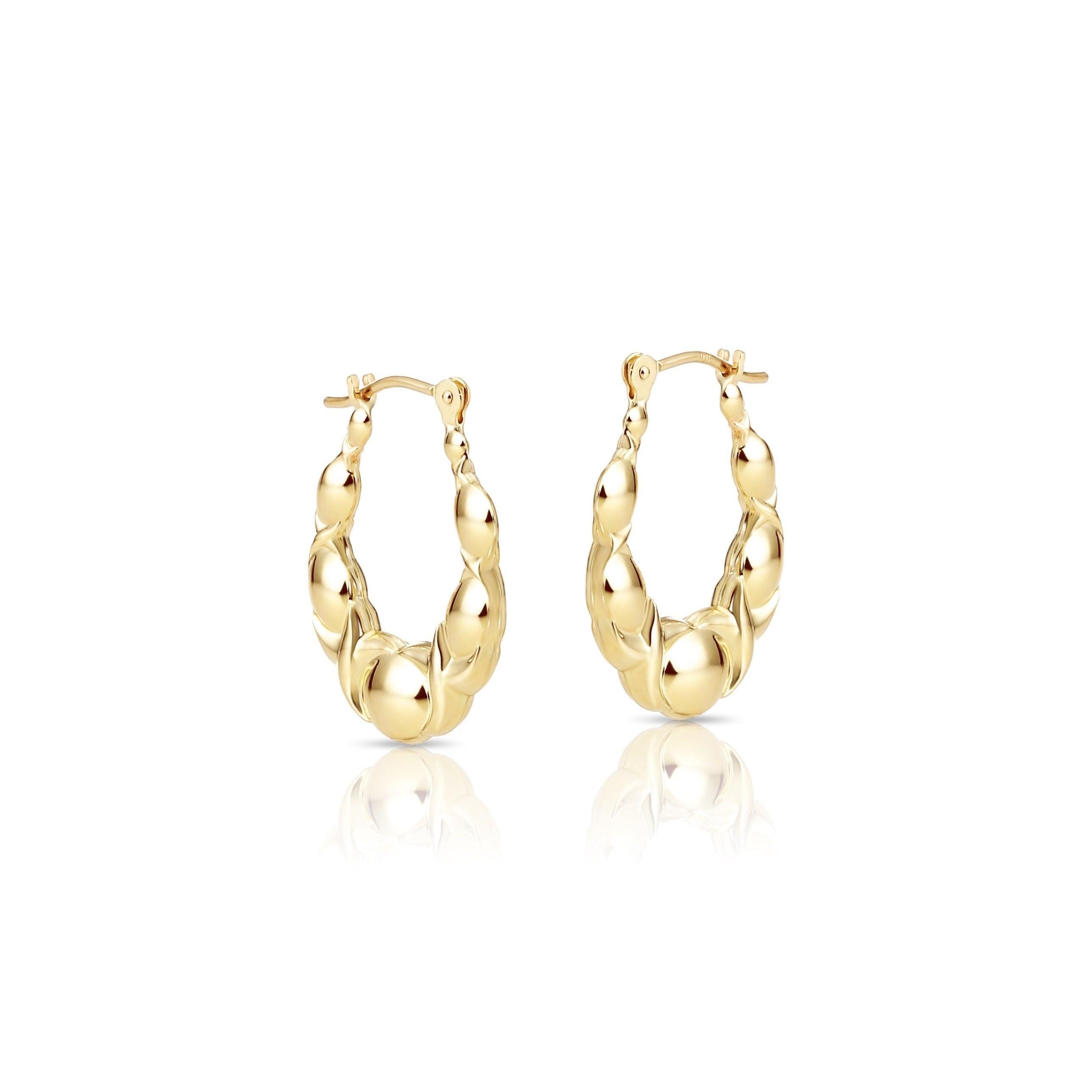 Stunning 10K Yellow Gold XO Polished Hoop Earrings - Chic NYC Design.