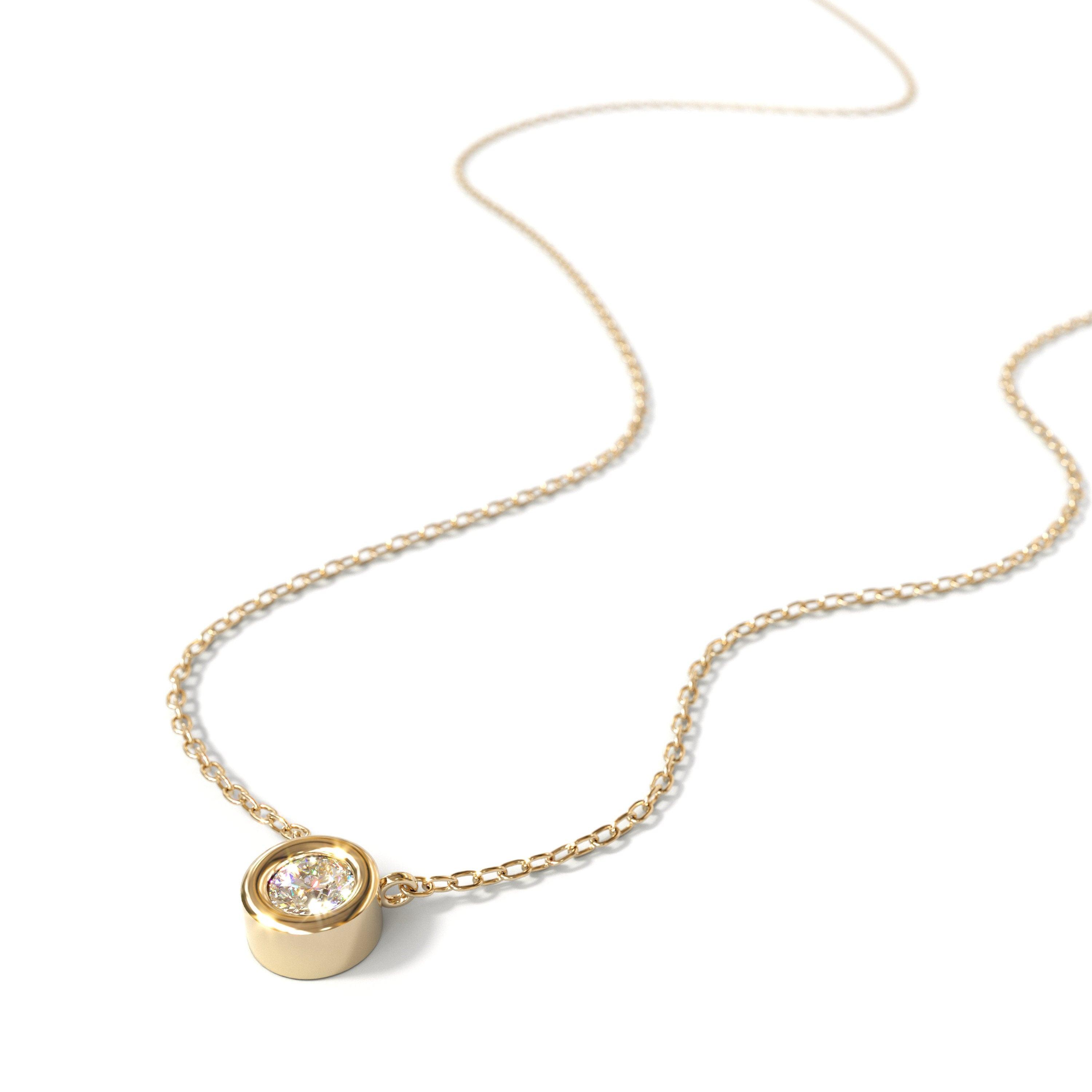 Elegant 14K Gold Diamond Solitaire Necklace - Minimalist Bezel Setting for Timeless Style.