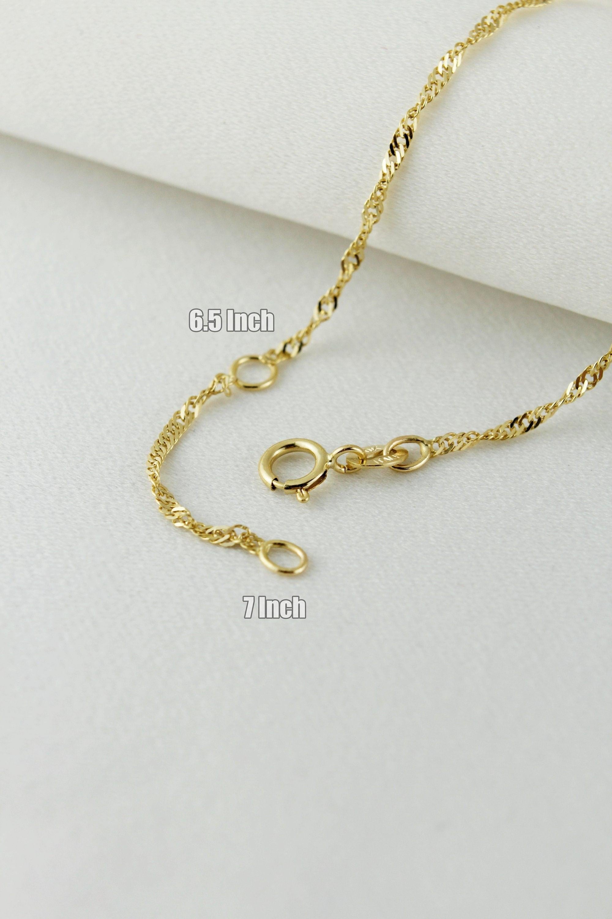 Elegant 10K Solid Gold Twisted Chain Bracelet - Dainty and Stackable Everyday Essential for Women.