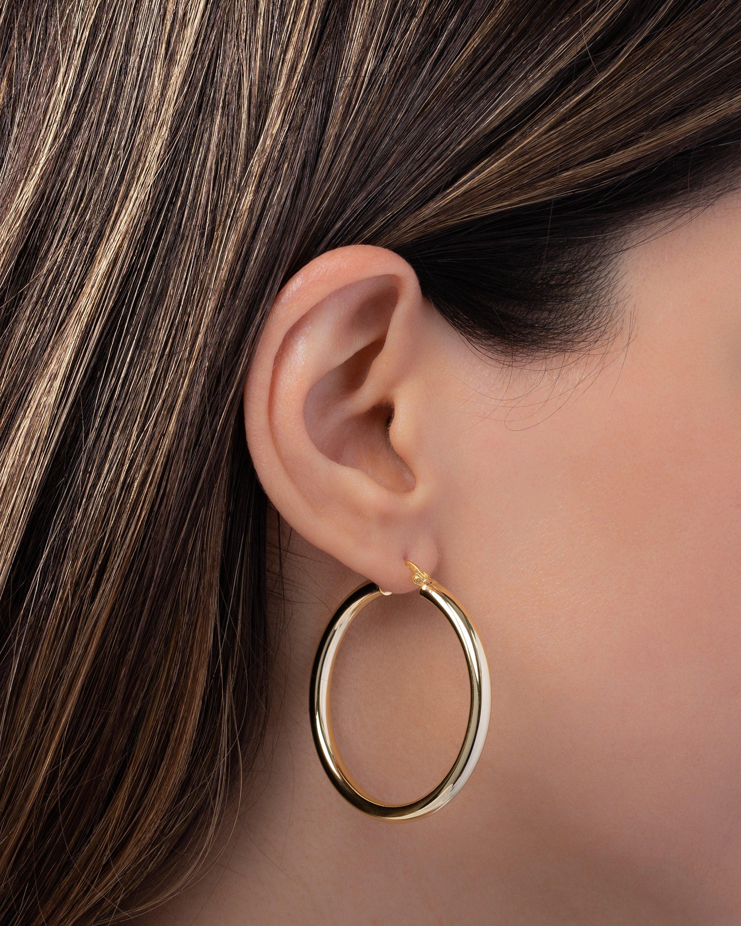 Luxurious Gold Vermeil Thick Hoop Earrings - Elegant & Timeless Statement Jewelry.