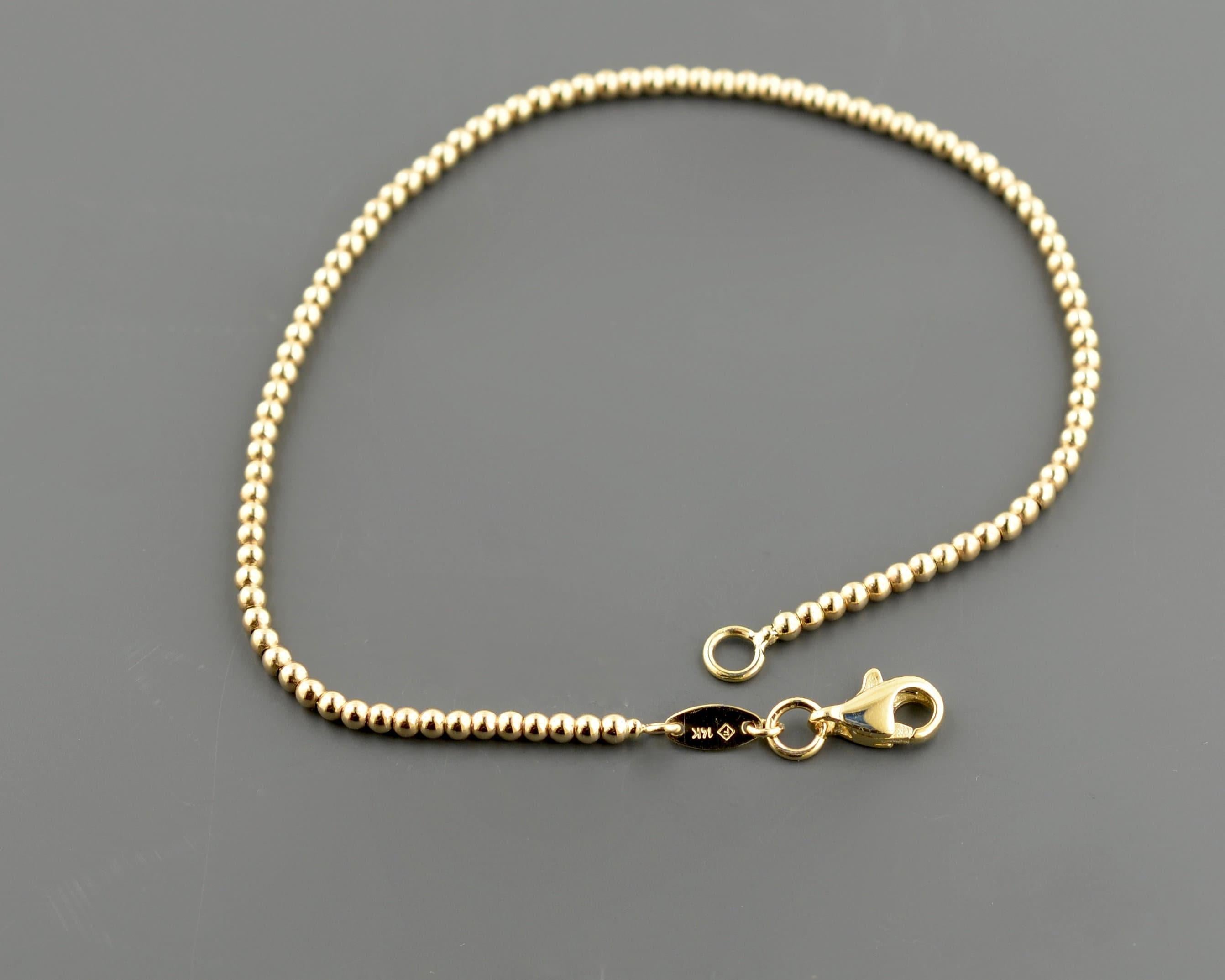 Elegant 14K Yellow Gold 2.0mm Bead Bracelet – 7.5 Inch with Secure Lobster Clasp.