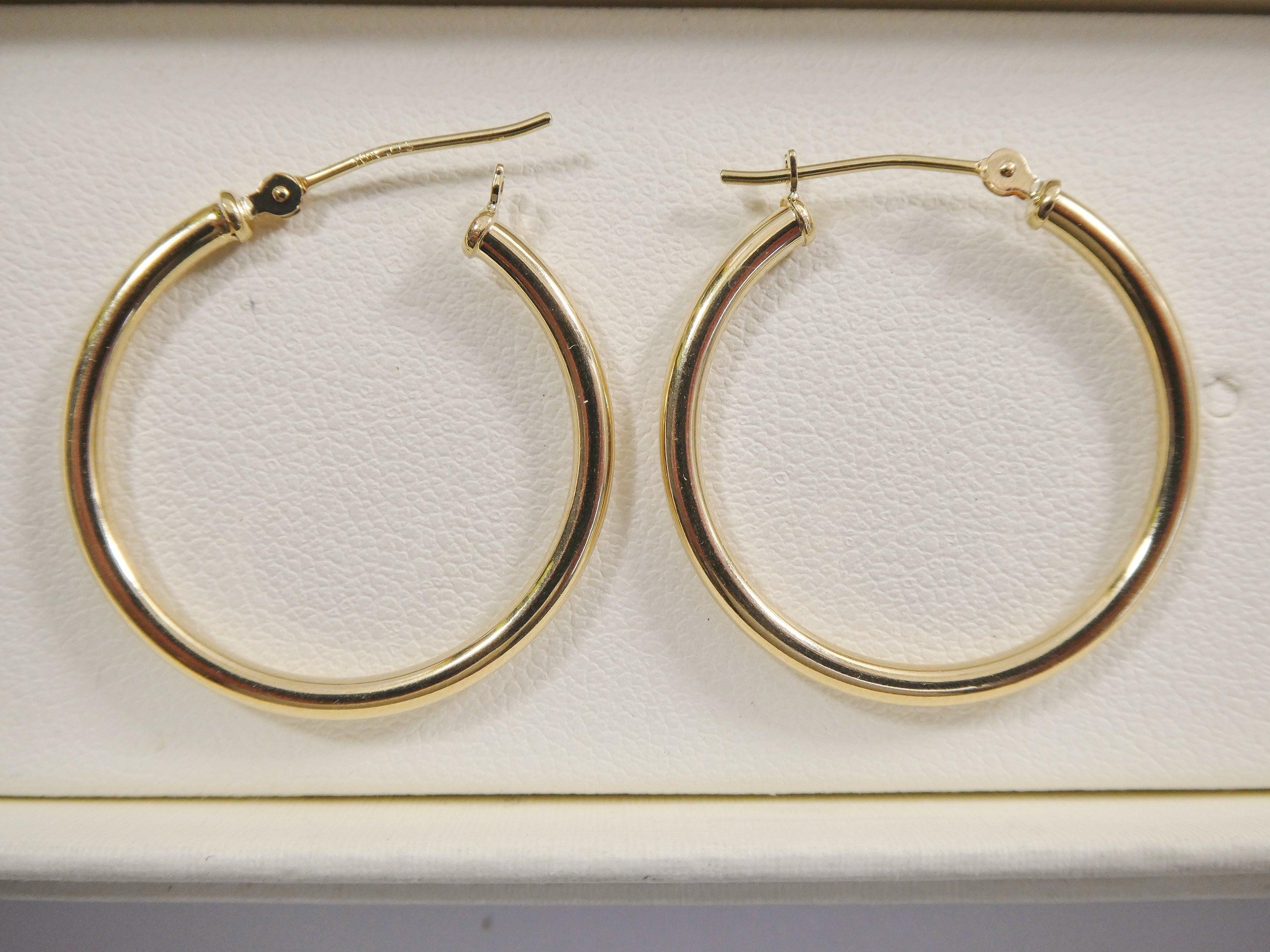Elegant 10K Yellow Gold Polished 2mm Hoop Earrings for Women.