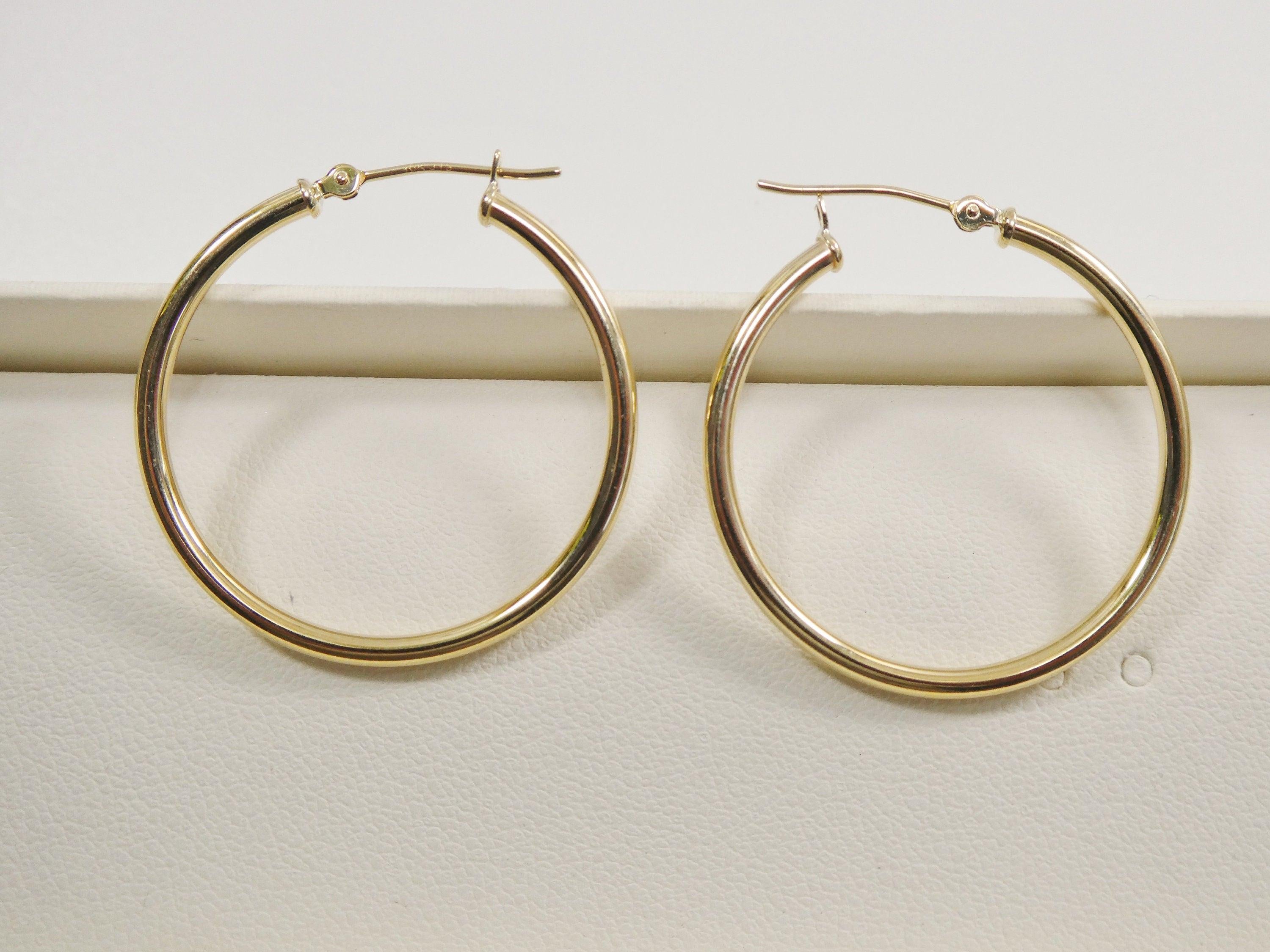 Elegant 10K Yellow Gold Polished 2mm Hoop Earrings for Women.