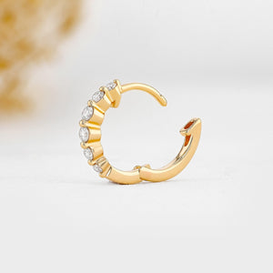 Stunning 14K Gold Diamond Graduated Huggie Hoop Earrings.