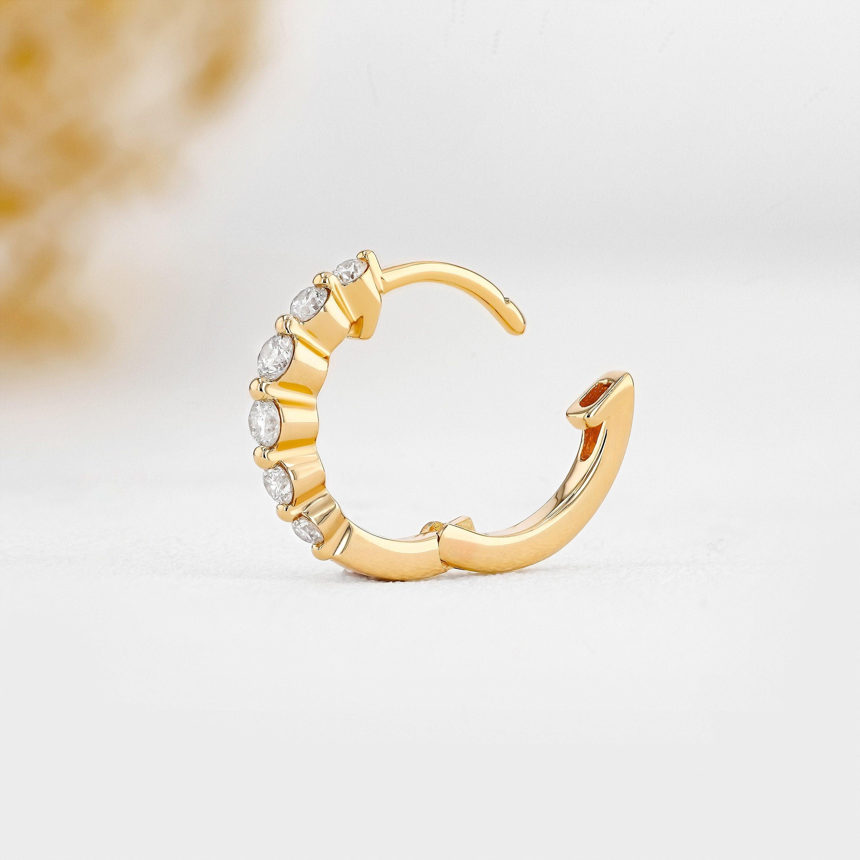 Stunning 14K Gold Diamond Graduated Huggie Hoop Earrings.