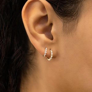 Stunning 14K Gold Diamond Graduated Huggie Hoop Earrings.