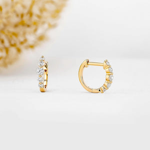 Stunning 14K Gold Diamond Graduated Huggie Hoop Earrings.