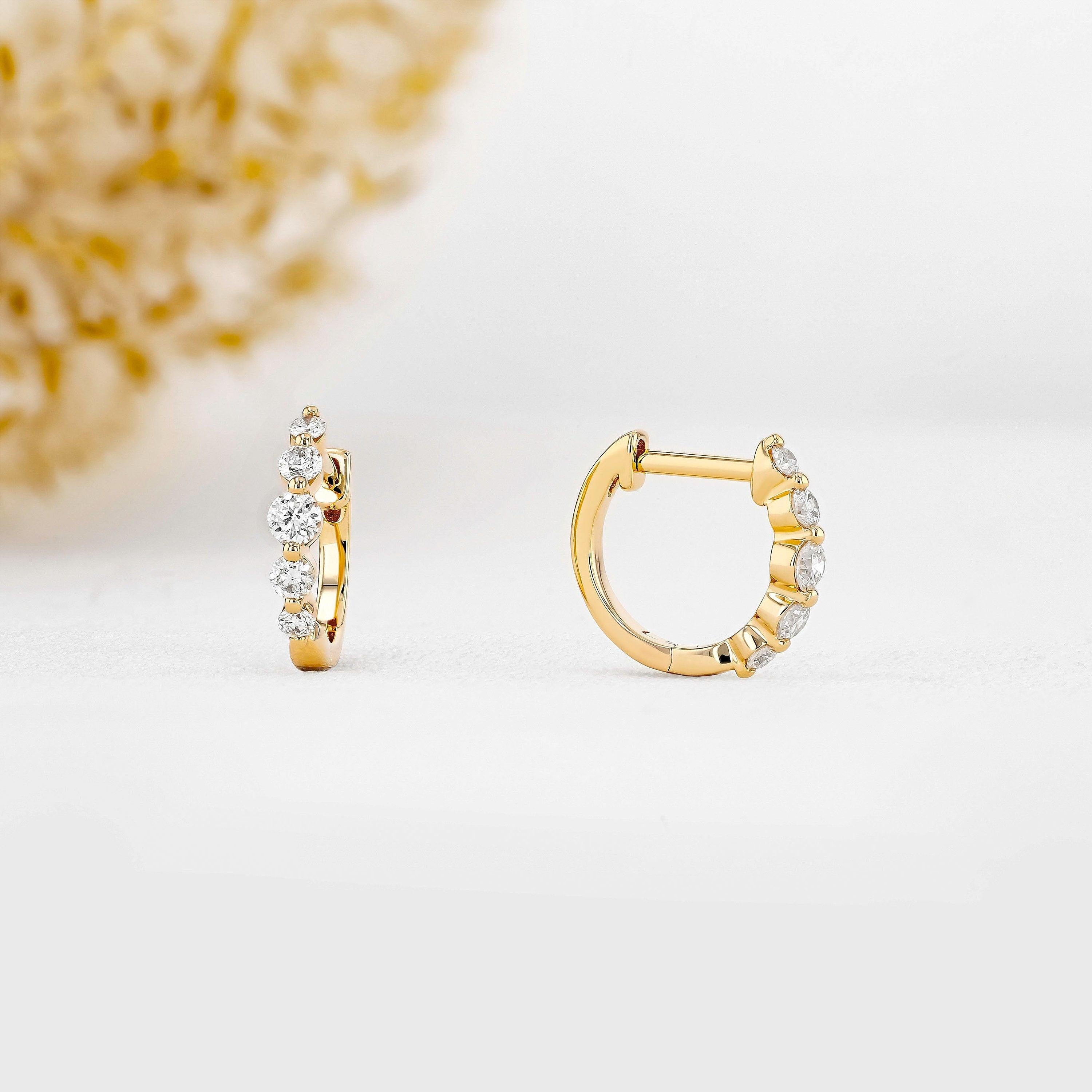 Stunning 14K Gold Diamond Graduated Huggie Hoop Earrings.