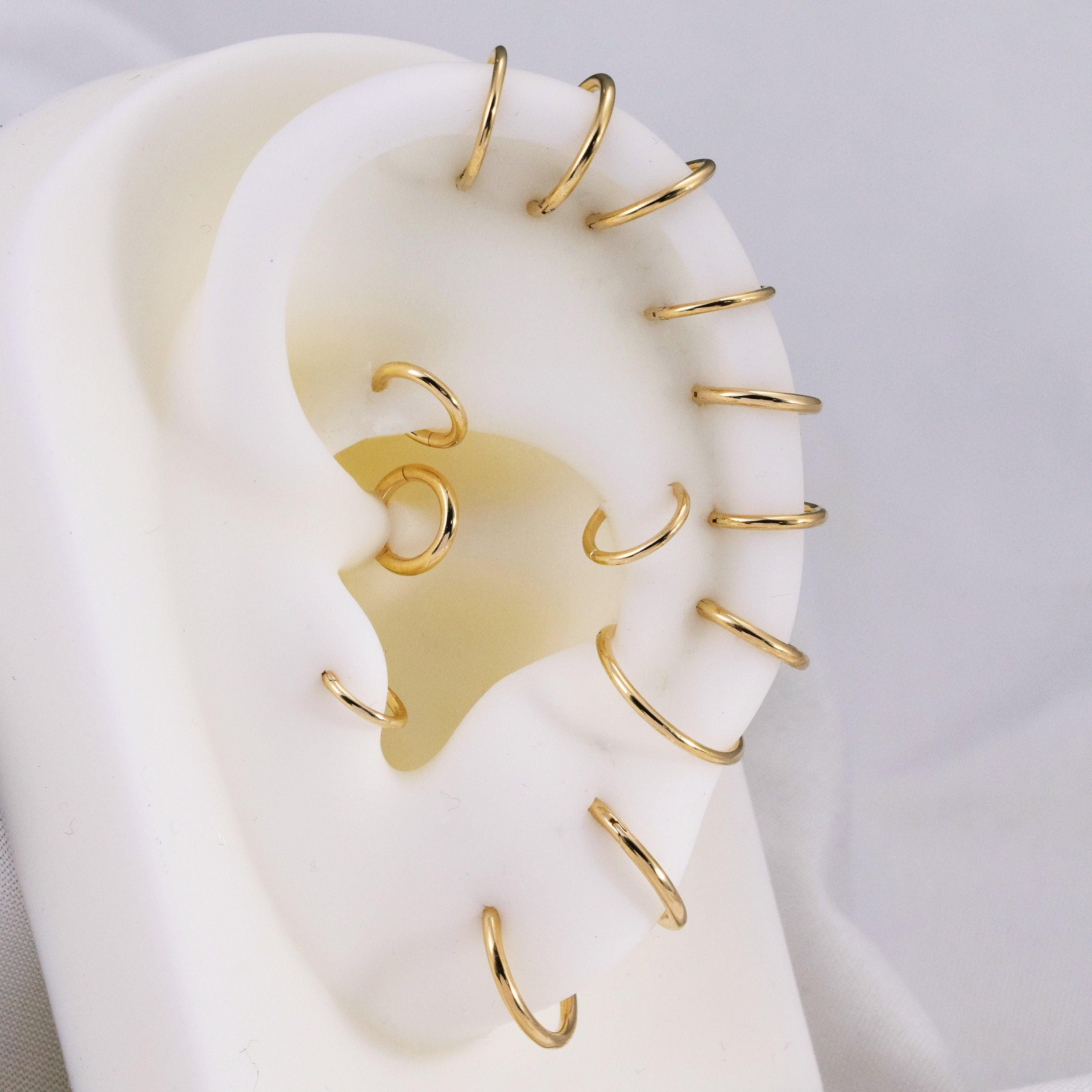 Luxurious 14K Solid Gold Seamless Hinged Clicker Hoop for Tragus, Helix, Conch, Nose, and Earlobe Piercings.