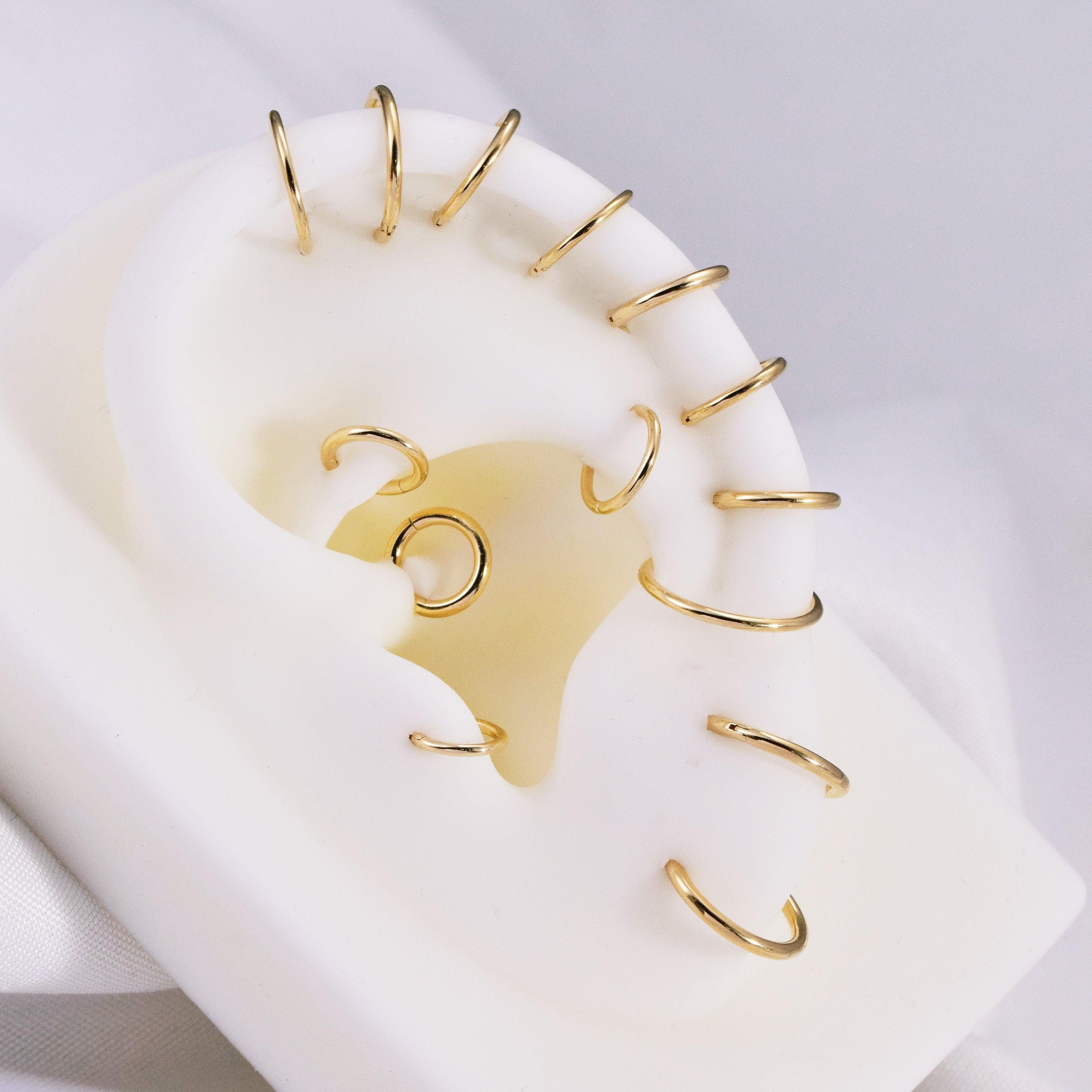 Luxurious 14K Solid Gold Seamless Hinged Clicker Hoop for Tragus, Helix, Conch, Nose, and Earlobe Piercings.