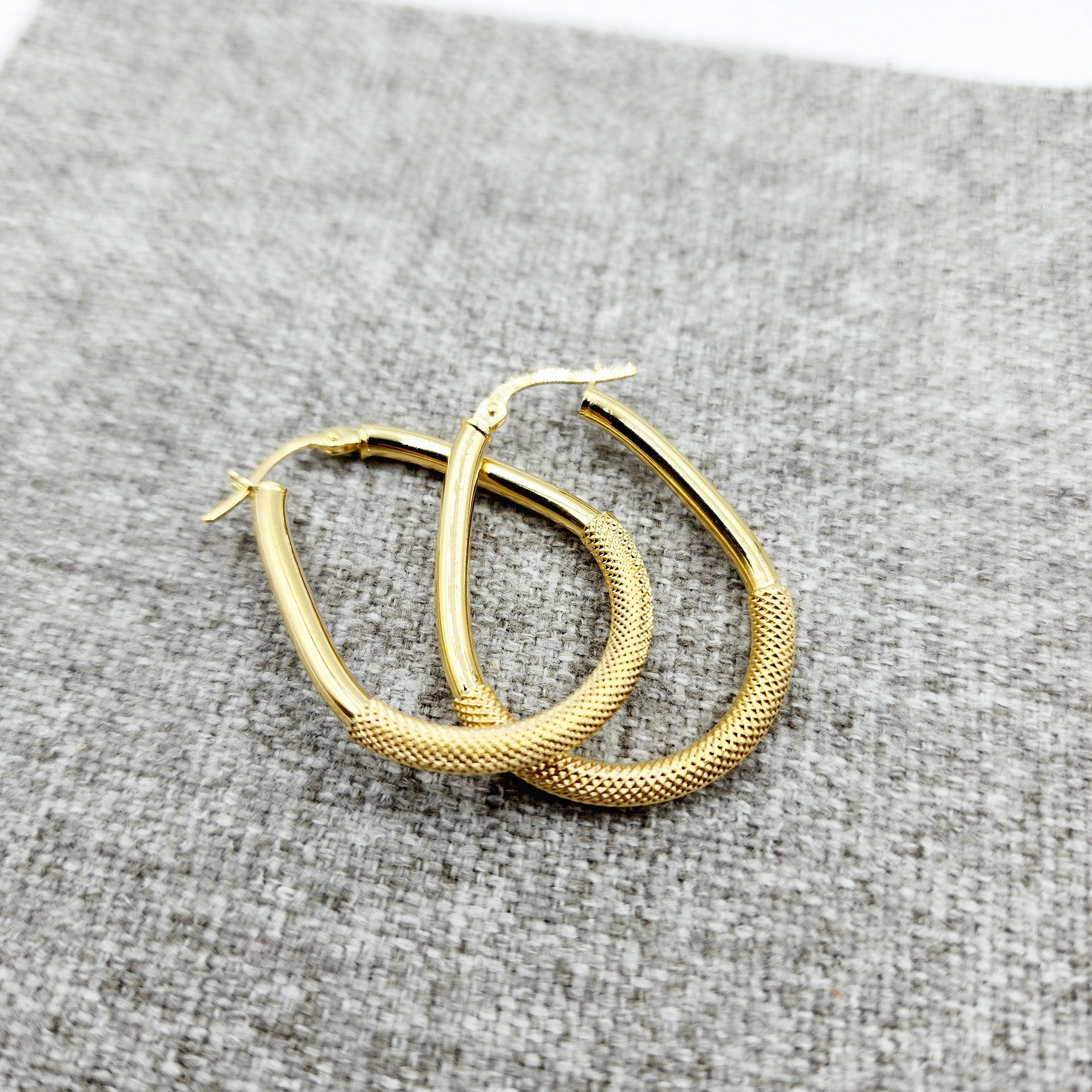 Elegant 10K Yellow Gold Textured Oval Hoop Earrings - Timeless Everyday Style.