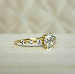 1 Carat Oval Cut Lab Grown Diamond Engagement Ring in 14K Yellow Gold.