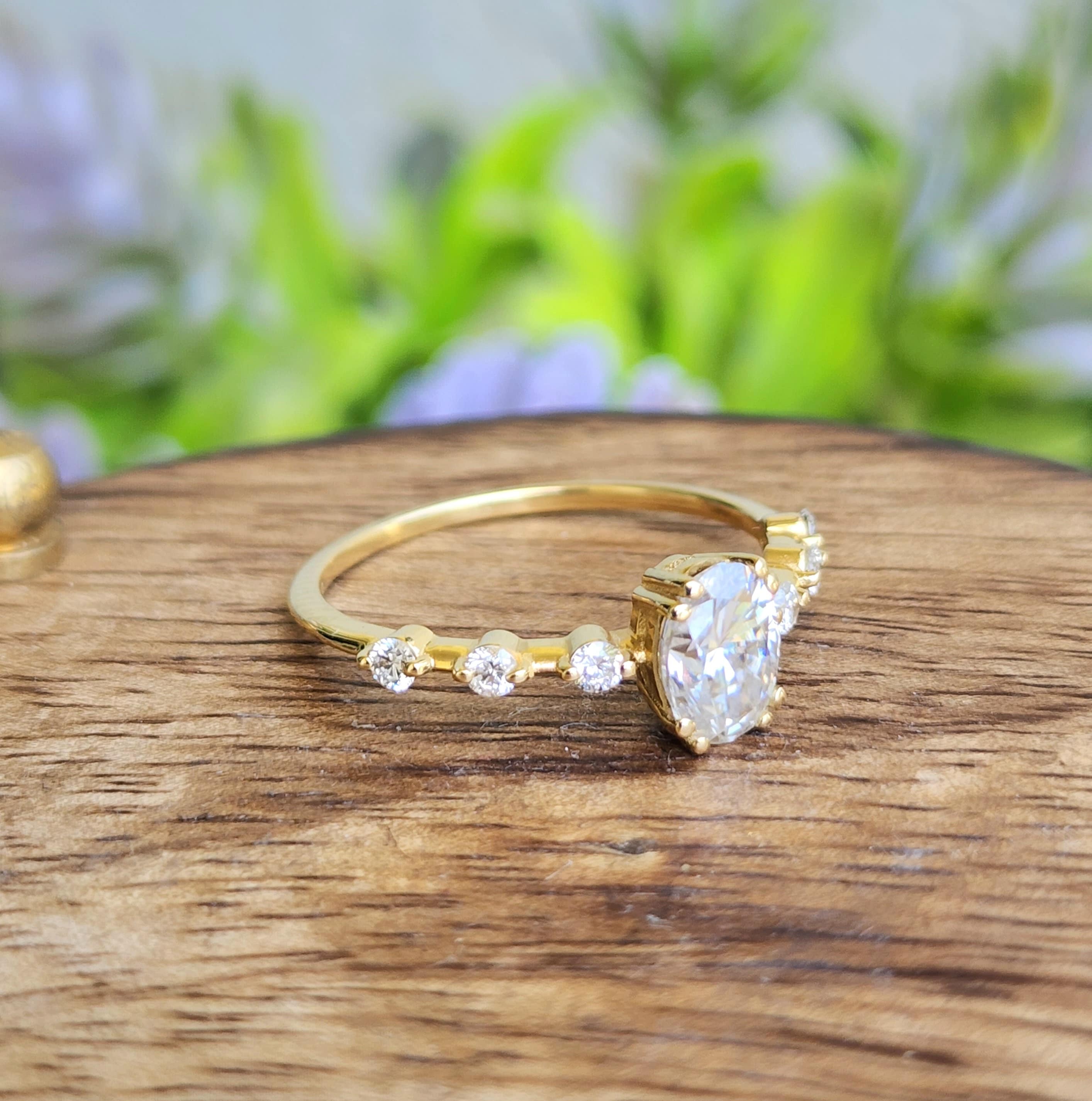 1 Carat Oval Cut Lab Grown Diamond Engagement Ring in 14K Yellow Gold.