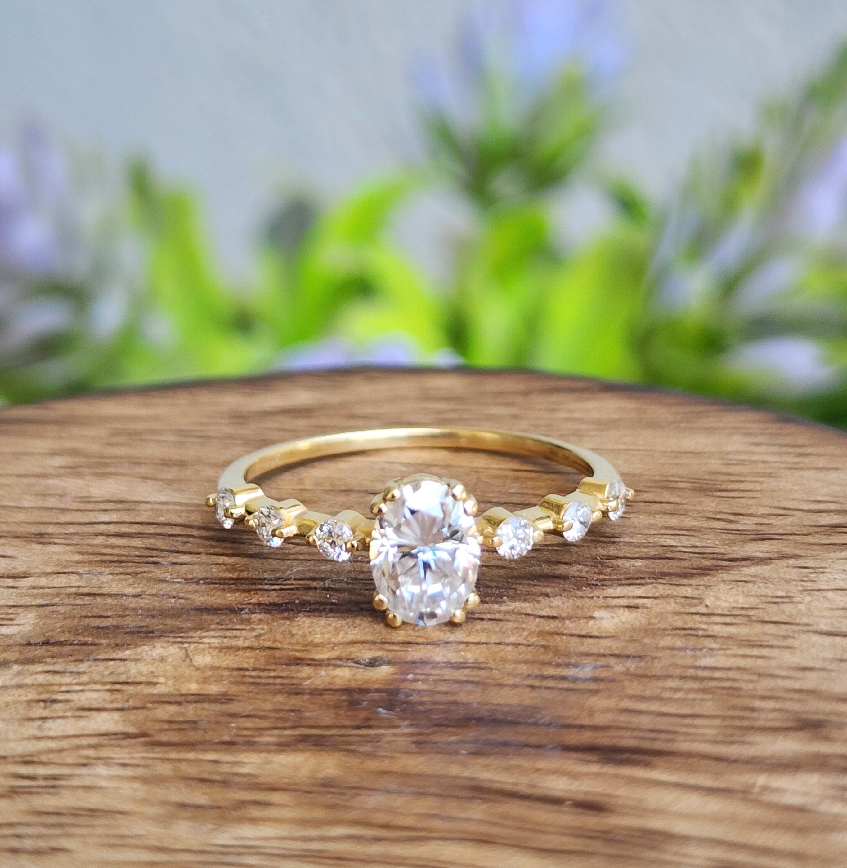 1 Carat Oval Cut Lab Grown Diamond Engagement Ring in 14K Yellow Gold.